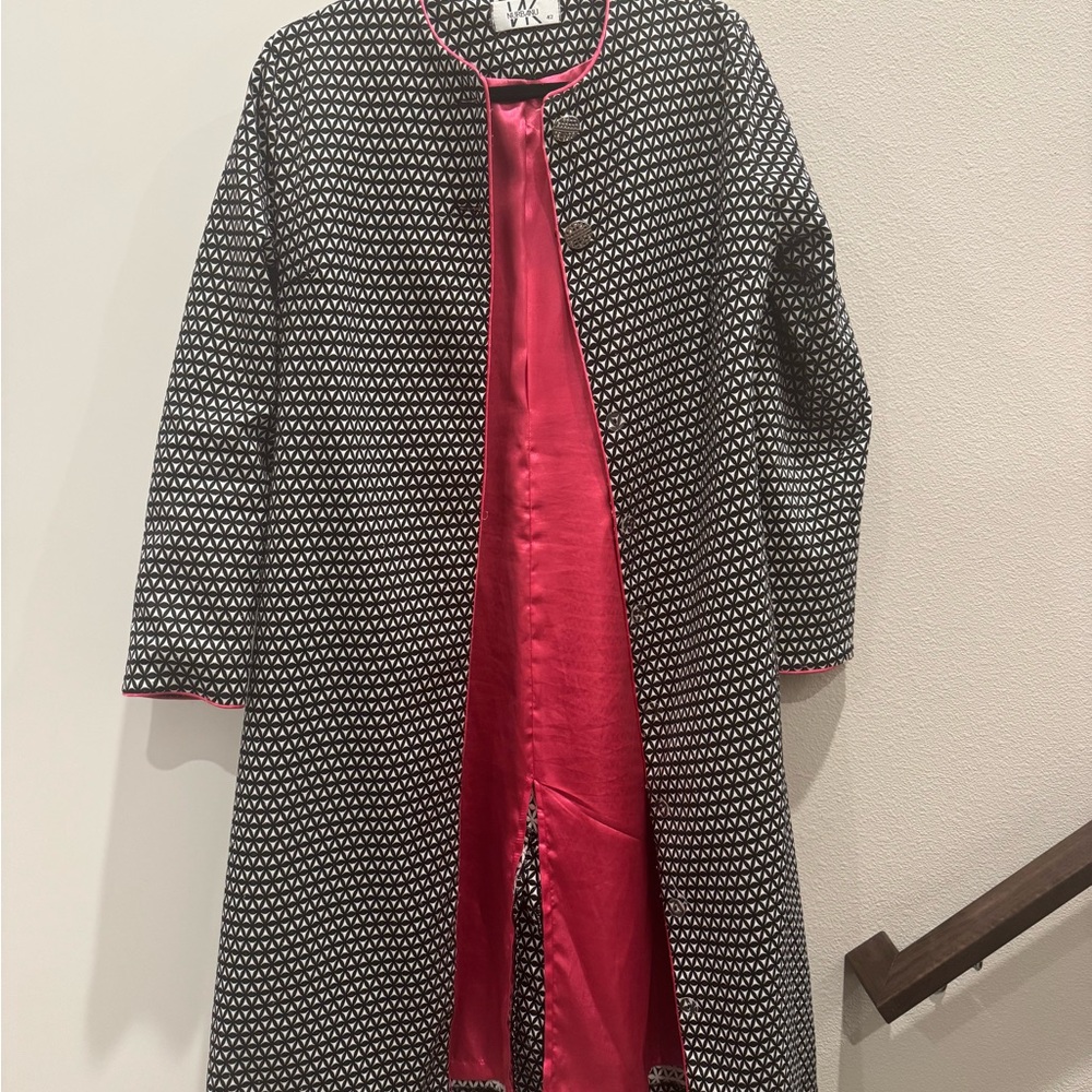 Chic Black and White Patterned Coat with Pink Lining